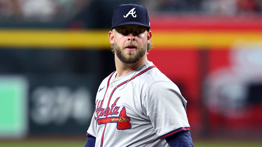 Jul 9, 2024; Phoenix, Arizona, USA; Atlanta Braves pitcher A.J. Minter against the Arizona Diamondbacks at Chase Field. Mandatory Credit: Mark J. Rebilas-Imagn Images