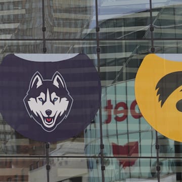Apr 6, 2024; Cleveland, OH, USA; A general overall view of the NCAA Women's Final Four and South Carolina Gamecocks, NC State Wolfpack, UConn Huskies and Iowa Hawkeyes logos on the the Rocket Mortgage FieldHouse facade. Mandatory Credit: Kirby Lee-Imagn Images