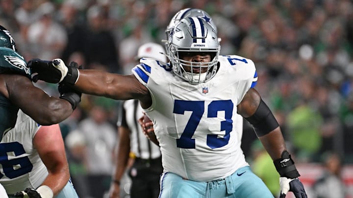 Dallas Cowboys guard Tyler Smith blocks against the Philadelphia Eagles. Dallas Cowboys guard Tyler Smith blocks against the Philadelphia Eagles.