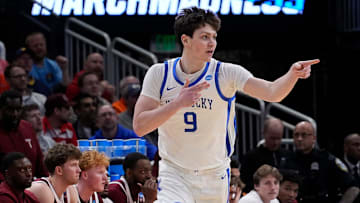 Kentucky forward Trent Noah (9) celebrates the three pointer during the first half of their first round NCAA men’ s basketball tournament game against Troy on Friday March 21, 2025 at Fiserv Forum in Milwaukee, Wis.