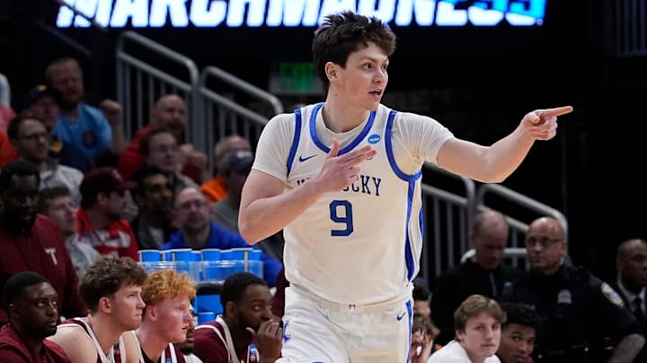 Kentucky forward Trent Noah (9) celebrates the three pointer during the first half of their first round NCAA men’ s basketball tournament game against Troy on Friday March 21, 2025 at Fiserv Forum in Milwaukee, Wis.