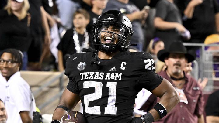 Oct 26, 2024; College Station, Texas, USA; Texas A&M Aggies linebacker Taurean York (21) reacts after catching the ball for an interception in the fourth quarter against the LSU Tigers at Kyle Field. Mandatory Credit: Maria Lysaker-Imagn Images. 