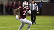 Oct 24, 2025; Blacksburg, Va.; Virginia Tech running back Marcellous Hawkins (27) runs the ball against California.