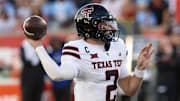 Oct 4, 2025; Houston, Texas, USA; Texas Tech Red Raiders quarterback Behren Morton (2) drops back to pass against the Houston Cougars in the first half at TDECU Stadium. Mandatory Credit: Thomas Shea-Imagn Images