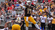 Wyoming Cowboys QB Josh Allen looks to pass against Gardner-Webb Bulldogs.