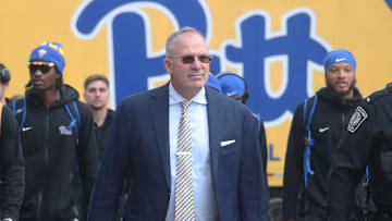 Oct 25, 2025; Pittsburgh, Pennsylvania, USA; Pittsburgh Panthers head coach Pat Narduzzi (middle) leads the Panthers to the stadium to play the North Carolina State Wolfpack at Acrisure Stadium. Mandatory Credit: Charles LeClaire-Imagn Images