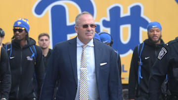 Oct 25, 2025; Pittsburgh, Pennsylvania, USA; Pittsburgh Panthers head coach Pat Narduzzi (middle) leads the Panthers to the stadium to play the North Carolina State Wolfpack at Acrisure Stadium. Mandatory Credit: Charles LeClaire-Imagn Images