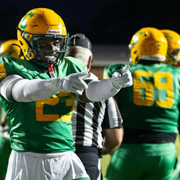 Nigel Nelson (23) celebrates scoring a touchdown and taking a 6-0 Crusaders lead during the Pace vs Catholic football game at Pensacola Catholic High School on Friday, Aug. 30, 2024.