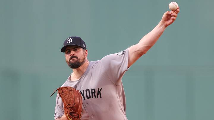 Jun 28, 2026; Boston, Massachusetts, USA; New York Yankees starting pitcher Carlos Rodon (55) delivers a pitch during the first inning against the Boston Red Sox at Fenway Park. Mandatory Credit: Paul Rutherford-Imagn Images
