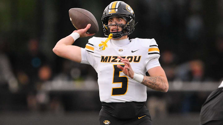 Missouri Tigers quarterback Matt Zollers (5) throws a pass in a game against the Vanderbilt Commodores this season.