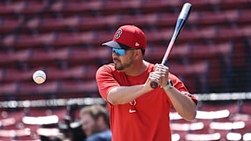 Aug 11, 2024; Boston, Massachusetts, USA; Boston Red Sox bench coach Ramon Vazquez (60) warms up the team before a game against the Houston Astros at Fenway Park.