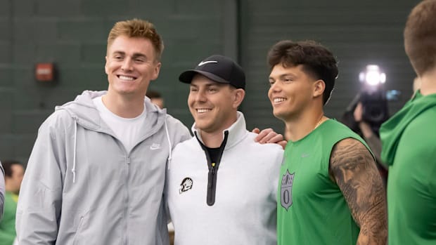 Denver Broncos quarterback Bo Nix, a former Oregon quarterback, left, and Oregon quarterback Dillon Gabriel, right