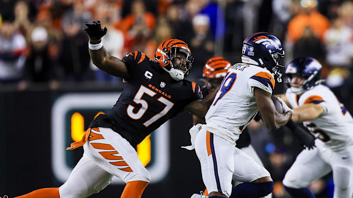 Dec 28, 2024; Cincinnati, Ohio, USA; Cincinnati Bengals linebacker Germaine Pratt (57) chases after Denver Broncos wide receiver Marvin Mims Jr. (19) in the first half at Paycor Stadium. 