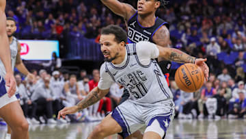 Nov 23, 2024; Orlando, Florida, USA; Detroit Pistons guard Marcus Sasser (25) defends Orlando Magic guard Cole Anthony (50) during the second half at Kia Center. Mandatory Credit: Mike Watters-Imagn Images