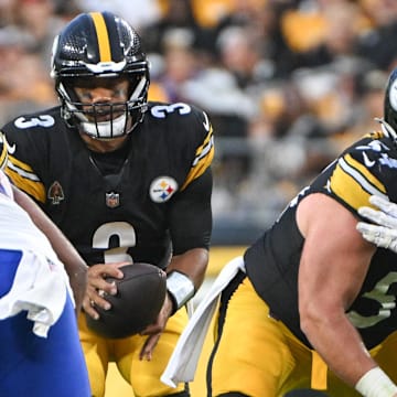 Aug 17, 2024; Pittsburgh, Pennsylvania, USA;  Pittsburgh Steelers center Zach Frazier (54) blocks against the Buffalo Bills during the first quarter at Acrisure Stadium. Mandatory Credit: Barry Reeger-Imagn Images