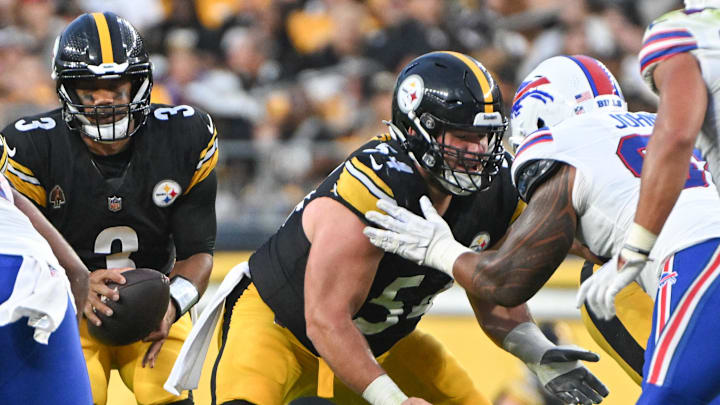 Aug 17, 2024; Pittsburgh, Pennsylvania, USA;  Pittsburgh Steelers center Zach Frazier (54) blocks against the Buffalo Bills during the first quarter at Acrisure Stadium. Mandatory Credit: Barry Reeger-Imagn Images