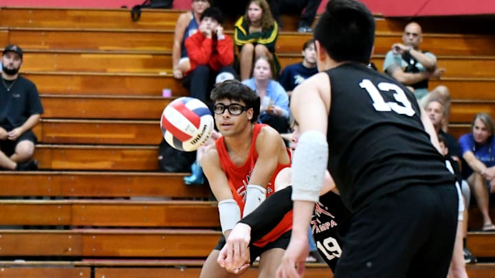 Tampa SLAM libero Joey Escalera-Hernandez sets up a shot against Miami True North during a 1A state semi at the FHSAA volleyball state tournament.