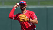 Mar 13, 2024; Surprise, Arizona, USA;  Los Angeles Angels second baseman Livan Soto (73) throws to first base against the Kansas City Royals during the second inning at Surprise Stadium