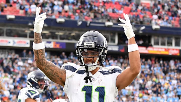Dec 24, 2023; Nashville, Tennessee, USA; Seattle Seahawks wide receiver Jaxon Smith-Njigba (11) celebrates after a touchdown by tight end Colby Parkinson (84) during the second half against the Tennessee Titans at Nissan Stadium.