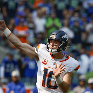 Sep 8, 2024; Seattle, Washington, USA; Denver Broncos quarterback Bo Nix (10) passes against the Seattle Seahawks during the second quarter at Lumen Field.