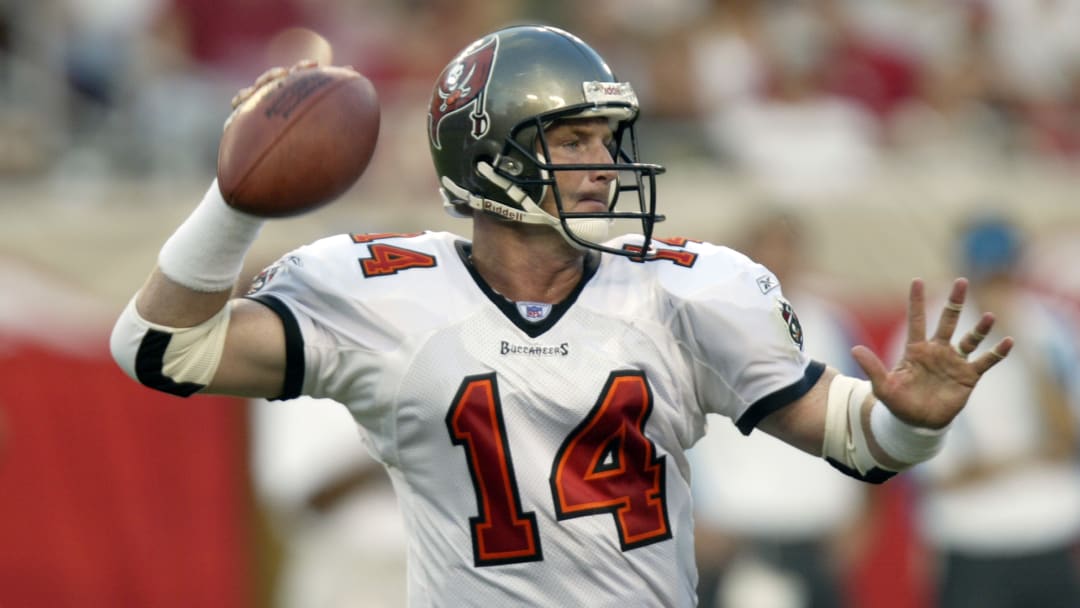 Brad Johnson looks to pass