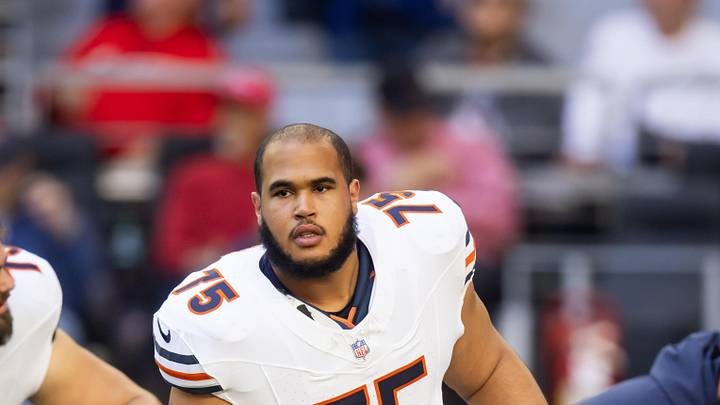 Nov 3, 2024; Glendale, Arizona, USA; Chicago Bears offensive tackle Larry Borom (75) against the Arizona Cardinals at State Farm Stadium.
