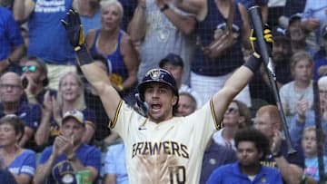 Aug 13, 2025; Milwaukee, Wisconsin, USA; Milwaukee Brewers outfielder Sal Frelick (10) celebrates as Milwaukee Brewers outfielder Blake Perkins (16) prepares to cross home plate against the Pittsburgh Pirates in the fourtfh inning at American Family Field. Mandatory Credit: Michael McLoone-Imagn Images