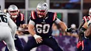 Sep 10, 2023; Foxborough, Massachusetts, USA; New England Patriots center David Andrews (60) snaps the ball during the second half against the Philadelphia Eagles at Gillette Stadium. Mandatory Credit: Eric Canha-Imagn Images
