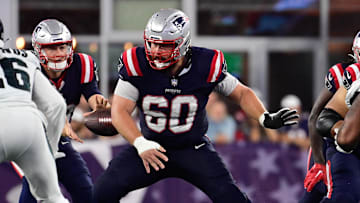 Sep 10, 2023; Foxborough, Massachusetts, USA; New England Patriots center David Andrews (60) snaps the ball during the second half against the Philadelphia Eagles at Gillette Stadium. Mandatory Credit: Eric Canha-Imagn Images