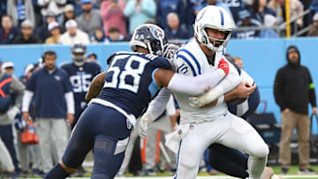 Dec 3, 2023; Nashville, Tennessee, USA; Tennessee Titans linebacker Harold Landry III (58) and linebacker Arden Key (49) combine for a sack on Indianapolis Colts quarterback Gardner Minshew (10) during the second half at Nissan Stadium. 