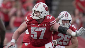 Wisconsin offensive lineman Jake Renfro (57) provides pas protection during the fourth quarter of their game against Ohio State Saturday, October 18, 2025 at Camp Randall Stadium in Madison, Wisconsin.