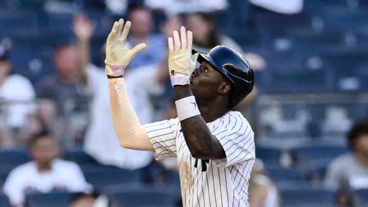 Aug 10, 2024; Bronx, New York, USA; New York Yankees third baseman Jazz Chisholm Jr. (13) reacts after hitting a solo home run against the Texas Rangers during the eighth inning at Yankee Stadium. Mandatory Credit: John Jones-USA TODAY Sports