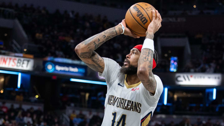 Feb 28, 2024; Indianapolis, Indiana, USA; New Orleans Pelicans forward Brandon Ingram (14) shoots the ball in the first half against the Indiana Pacers at Gainbridge Fieldhouse