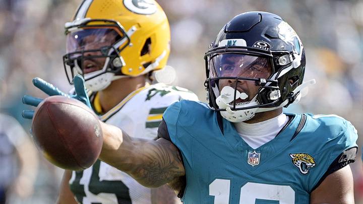 Oct 27, 2024; Jacksonville, Florida, USA; Jacksonville Jaguars wide receiver Christian Kirk (13) signals a first down during the second half against the Green Bay Packers at EverBank Stadium. 
