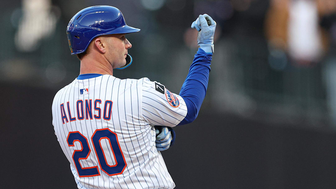 Apr 8, 2025; New York City, New York, USA; New York Mets first baseman Pete Alonso (20) reacts after hitting a three RBI double during the sixth inning against the Miami Marlins at Citi Field. Mandatory Credit: Vincent Carchietta-Imagn Images