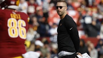 Washington offensive coordinator Kliff Kingsbury during warmups prior to a game against the Dallas Cowboys