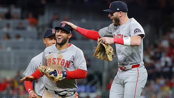 Boston Red Sox shortstop Trevor Story celebrates a brilliant play from first baseman Abraham Toro.