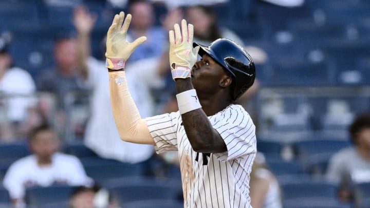 Aug 10, 2024; Bronx, New York, USA; New York Yankees third baseman Jazz Chisholm Jr. (13) reacts after hitting a solo home run against the Texas Rangers during the eighth inning at Yankee Stadium. Mandatory Credit: John Jones-USA TODAY Sports