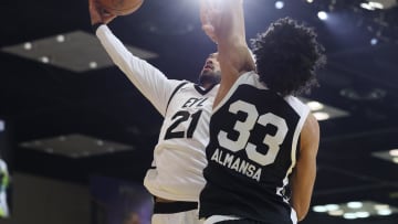 Feb 18, 2024; Indianapolis, Indiana, USA; Team ELY guard Trevelin Queen (21) of the Osceola Magic shoots the ball defended by Team BallIsLife forward Izan Almansa (33) G League Ignite during the G-League Next Up game at Indiana Convention Center. Mandatory Credit: Trevor Ruszkowski-USA TODAY Sports