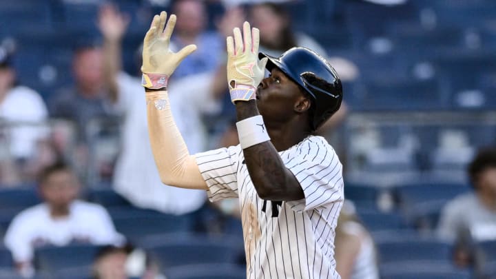 Aug 10, 2024; Bronx, New York, USA; New York Yankees third baseman Jazz Chisholm Jr. (13) reacts after hitting a solo home run against the Texas Rangers during the eighth inning at Yankee Stadium. Mandatory Credit: John Jones-USA TODAY Sports