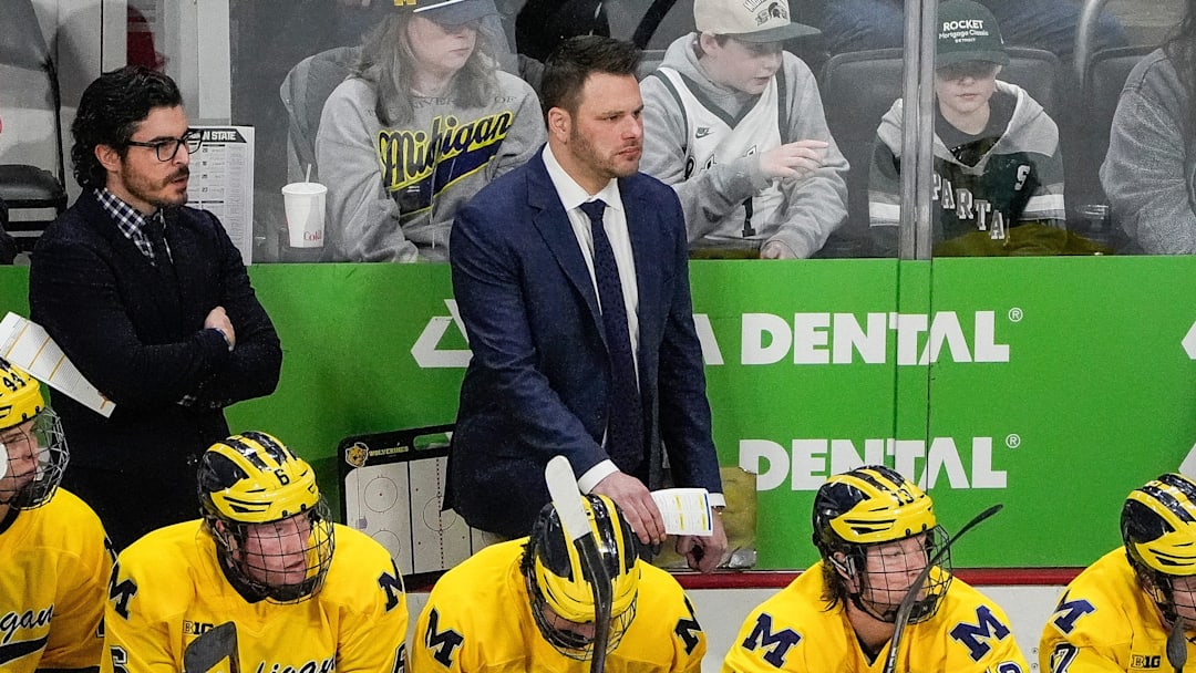 Michigan head coach Brandon Naurato watches a play against Michigan State during the first period of Duel in the D at Little Caesars Arena in Detroit on Saturday, Feb. 8, 2025.