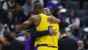 Dec 21, 2022; Sacramento, California, USA; Los Angeles Lakers forward LeBron James (6) hugs Sacramento Kings head coach Mike Brown during the first quarter at Golden 1 Center. Mandatory Credit: Sergio Estrada-USA TODAY Sports