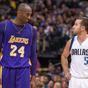 Nov 13, 2015; Dallas, TX, USA; Los Angeles Lakers forward Kobe Bryant (24) and Dallas Mavericks guard J.J. Barea (5) during the game at the American Airlines Center. The Mavericks defeat the Lakers 90-82. Mandatory Credit: Jerome Miron-Imagn Images
