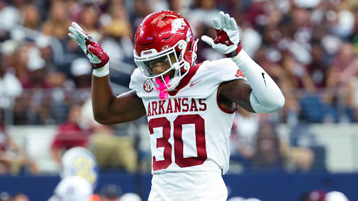 Sep 28, 2024; Arlington, Texas, USA;  Arkansas Razorbacks linebacker Larry Worth III (30) reacts during the first half against the Texas A&M Aggies at AT&T Stadium. Mandatory Credit: Kevin Jairaj-Imagn Images