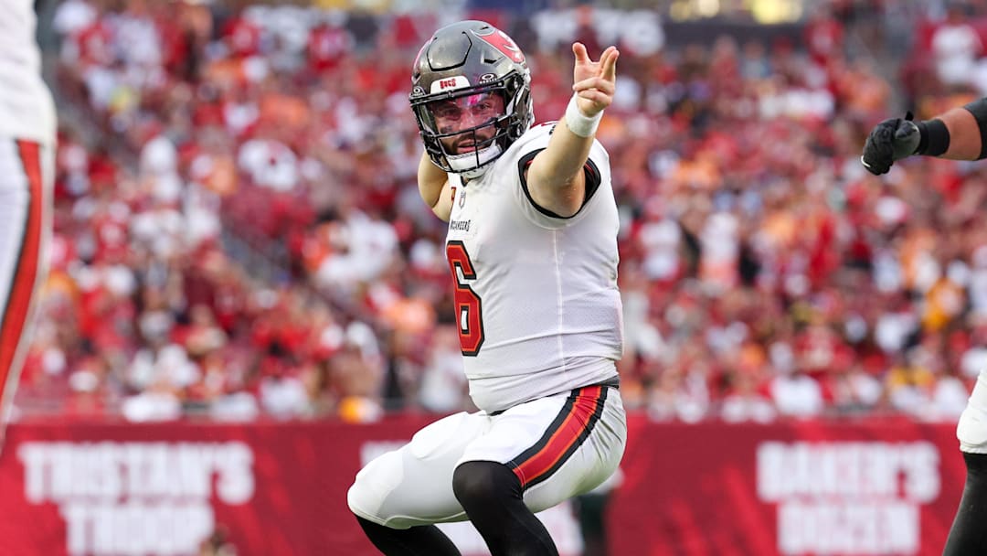 Tampa Bay Buccaneers quarterback Baker Mayfield reacts after a first down against the Washington Commanders.