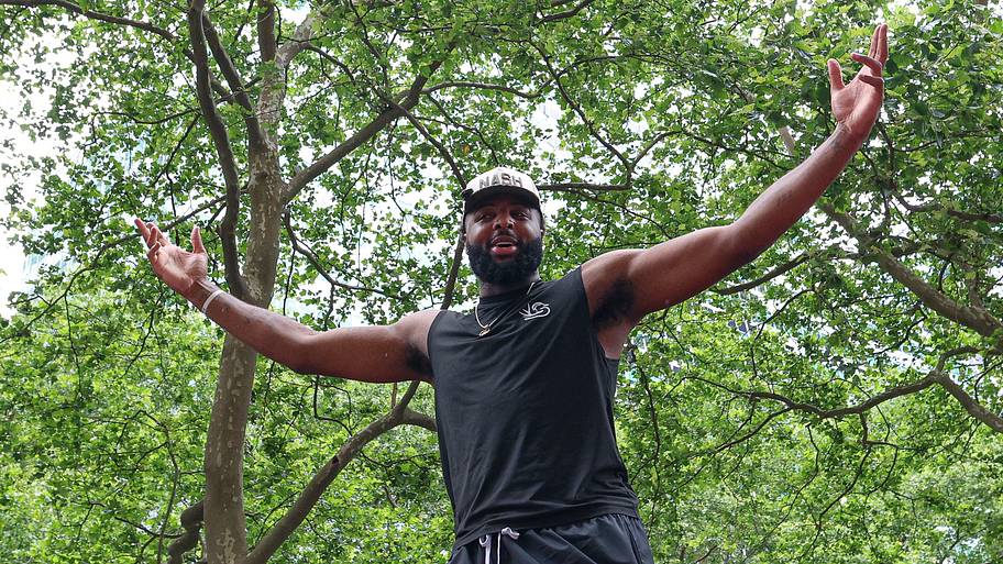 New York Knicks center Mitchell Robinson celebrates during the Knicks championship ticker tape parade.