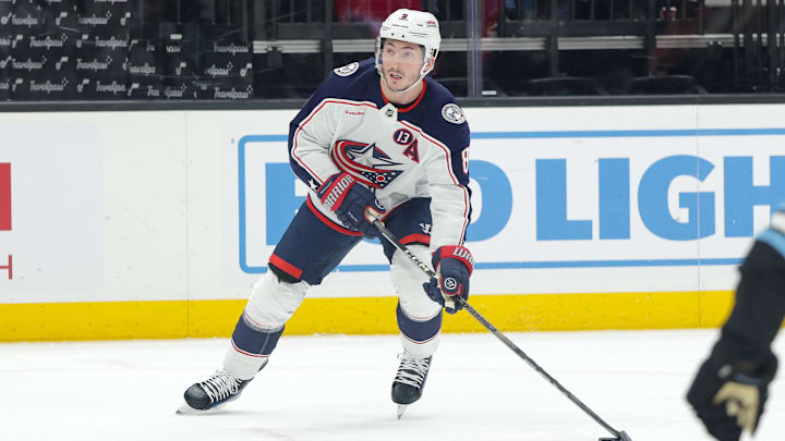 Jan 31, 2025; Salt Lake City, Utah, USA;  Columbus Blue Jackets defenseman Zach Werenski (8) looks to shoot the puck against the Utah Hockey Club during the first period at Delta Center. Mandatory Credit: Chris Nicoll-Imagn Images