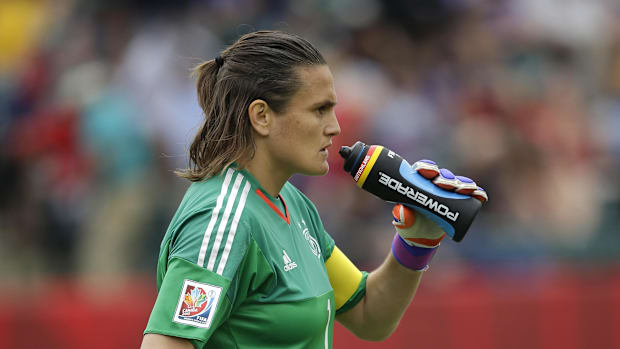 ermany goalkeeper Nadine Angerer cools off during the first half against England