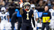 Sep 8, 2024; New Orleans, Louisiana, USA;  New Orleans Saints cornerback Alontae Taylor (1) reacts to sacking Carolina Panthers quarterback Bryce Young (9) during the second half at Caesars Superdome. Mandatory Credit: Stephen Lew-Imagn Images