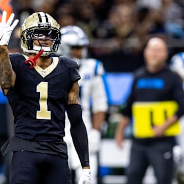 Sep 8, 2024; New Orleans, Louisiana, USA;  New Orleans Saints cornerback Alontae Taylor (1) reacts to sacking Carolina Panthers quarterback Bryce Young (9) during the second half at Caesars Superdome. Mandatory Credit: Stephen Lew-Imagn Images